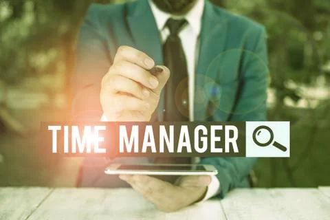 Handwriting text Time Manager. Concept meaning process of planning and Stock Photos