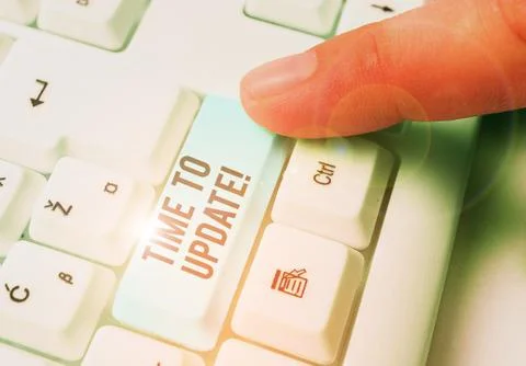 Handwriting text Time To Update. Concept meaning this right moment to make Stock Photos