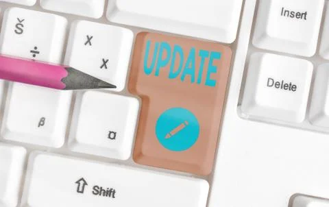 Handwriting text Update. Concept meaning Make something more modern Adding new Stock Photos