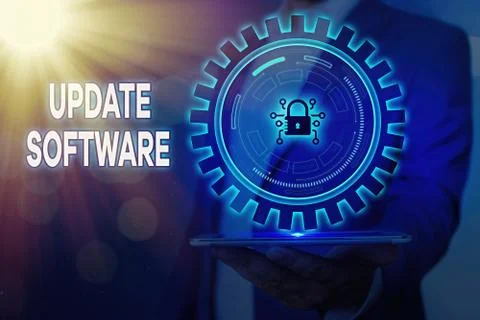 Handwriting text Update Software. Concept meaning an application patch fixing Stock Photos
