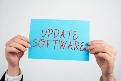 Handwriting text Update Software. Concept meaning an application patch fixing Stock Photos