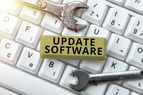 Handwriting text Update Software. Word Written on an application patch fixing Stock Photos