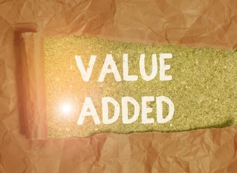 Handwriting text Value Added. Concept meaning the extra value created over and Stock Photos