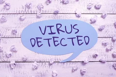 Handwriting text Virus DetectedA computer program used to prevent and remove Stock Photos