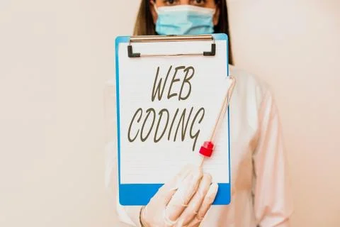 Handwriting text Web Coding. Concept meaning a system of symbols and rules used Foto stock