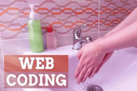Handwriting text Web Coding. Concept meaning a system of symbols and rules used Stock Photos