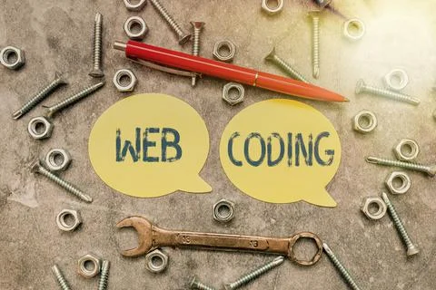 Handwriting text Web Coding. Internet Concept a system of symbols and rules used 写真素材
