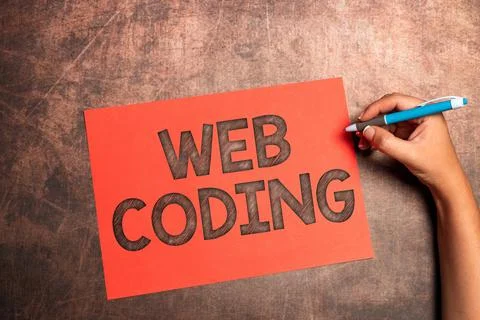 Handwriting text Web Coding. Internet Concept a system of symbols and rules used Stock Photos