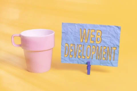 Handwriting text Web Development. Concept meaning work involved in developing a Stock Photos