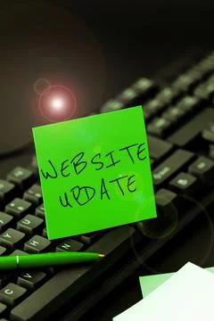 Handwriting text Website Update. Word for keeping the webpage and content up to Stockfoto's