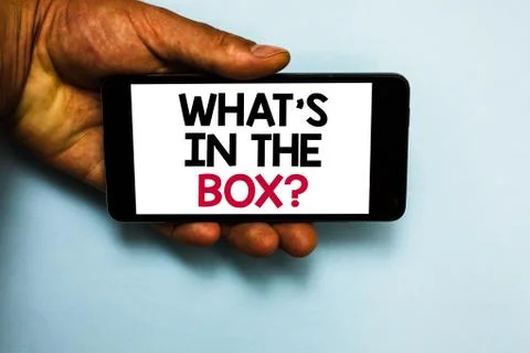 Handwriting text What s is In The Box question. Concept meaning Curiosity Ope Stock Photos