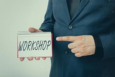 Handwriting text Workshop. Concept meaning space or a building where the goods Fotos de archivo
