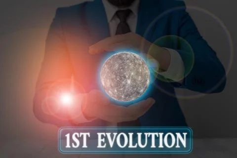 Handwriting text writing 1St Evolution. Concept meaning Change in the genetic 스톡 사진