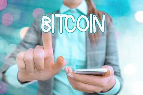 Handwriting text writing Bitcoin. Concept meaning Cryptocurrency Blockchain Stock Photos