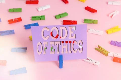 Handwriting text writing Code Of Ethics. Concept meaning basic guide for Stock Photos