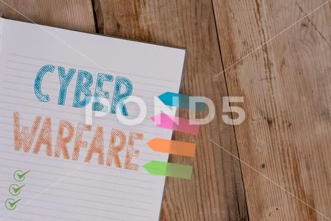 Handwriting text writing Cyber Warfare. Concept meaning Virtual War Hackers Stock Photos