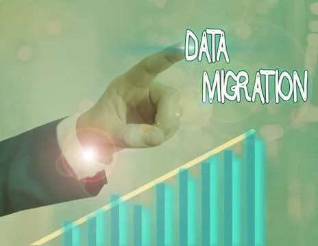 Handwriting text writing Data Migration. Concept meaning process of transferring Stock Photos