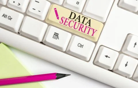 Handwriting text writing Data Security. Concept meaning Confidentiality Disk Stock Photos