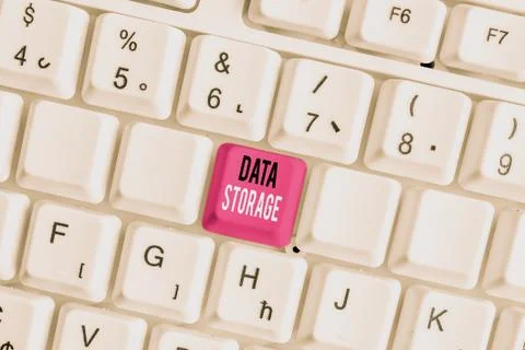 Handwriting text writing Data Storage. Concept meaning the act of archiving data 写真素材