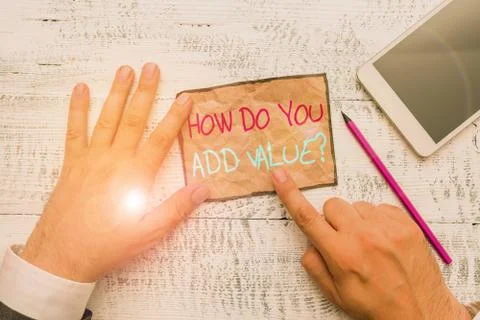 Handwriting text writing How Do You Add Value Question. Concept meaning improve Stock Photos
