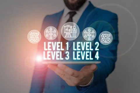 Handwriting text writing Level 1, 2, 3 and 4. Concept meaning Steps levels of a Foto stock
