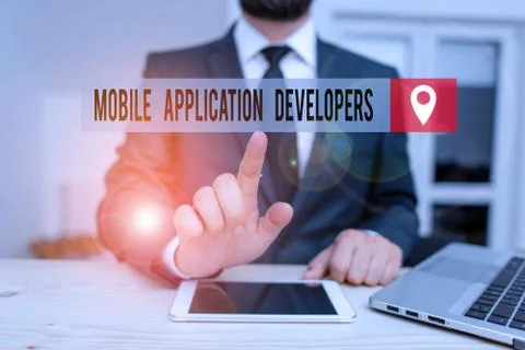 Handwriting text writing Mobile Application Developers. Concept meaning create Stock Photos