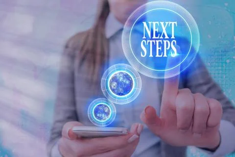 Handwriting text writing Next Steps. Concept meaning numper of process going to Stock Photos