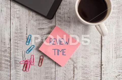 Handwriting text writing Review Time. Concept meaning to think or talk about Stock Photos