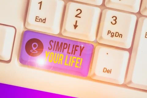 Handwriting text writing Simplify Your Life. Concept meaning focused on Stock Photos