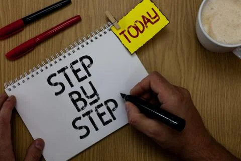 Handwriting text writing Step By Step. Concept meaning Slow progress Road to Stock Photos