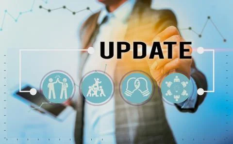 Handwriting text writing Update. Concept meaning by adding new information or Stock Photos