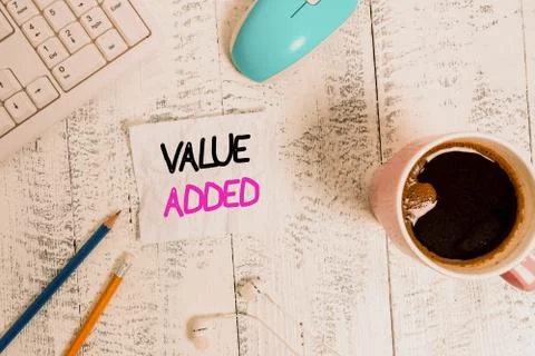 Handwriting text writing Value Added. Concept meaning the extra value created 스톡 사진