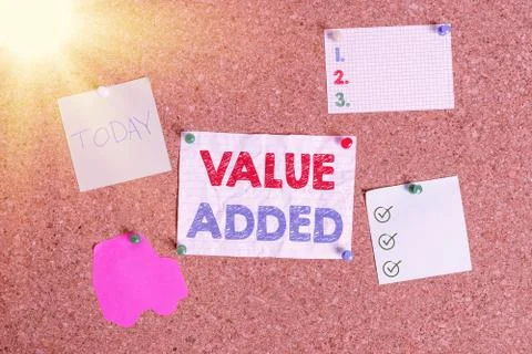 Handwriting text writing Value Added. Concept meaning the extra value created 스톡 사진