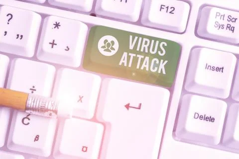 Handwriting text writing Virus Attack. Concept meaning malicious program that Fotos de archivo