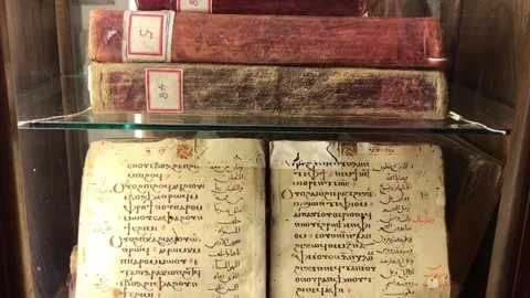 Handwritten Coptic Prayer Manuscripts on Display Stock Footage 327356951