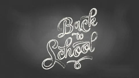 Handwritten curly typography font with the text back to school drawn with white Stock Footage 129541719