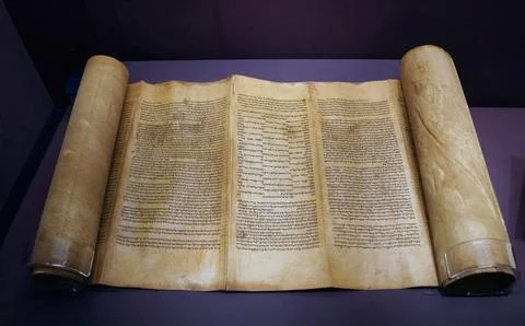 Handwritten Hebrew Torah scroll of the first five books of the Bible Stock Photos