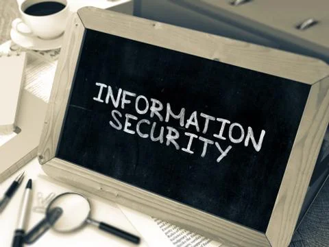 Handwritten Information Security on a Chalkboard Stock Illustration