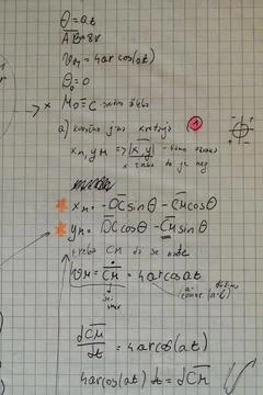 Handwritten kinematics equations angular motion notebook Stock Photos