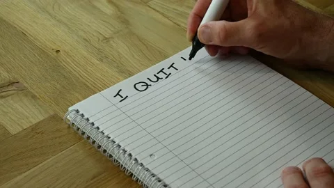 A handwritten letter of resignation being started Stock Footage 229248996