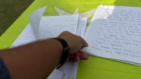 Handwritten Notes and Pen on Paper Blue Text for Education Clip 14 Stock Footage 289586492