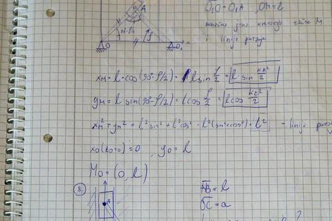 Handwritten physics equations point kinematics notebook Stock Photos