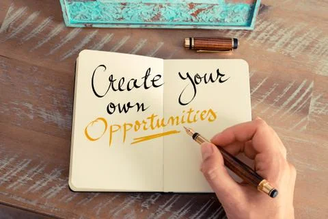 Handwritten text Create your Own Opportunities Stock Photos