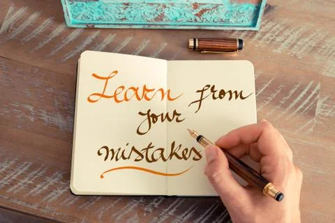 Handwritten text LEARN FROM YOUR MISTAKES Stock Photos