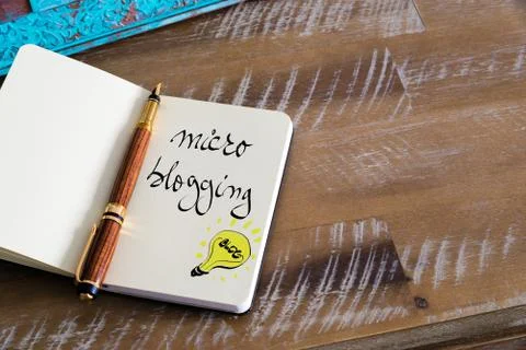 Handwritten text MICRO BLOGGING Stock Photos