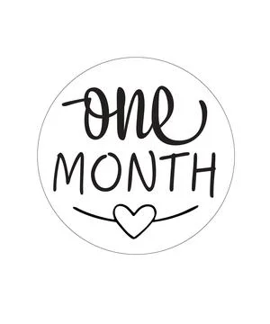 Handwritten text reading one month sits inside a circle above a small heart i Stock Illustration