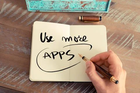 Handwritten text USE MORE APPS Stock Photos
