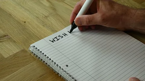 A handwritten wish list being started Stock Footage 229249006