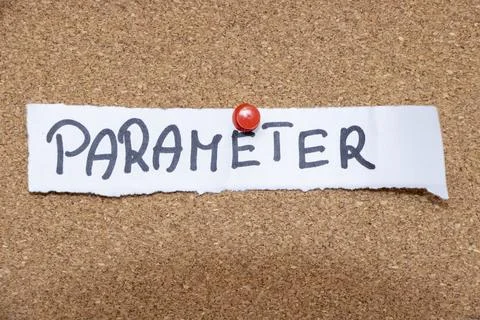 Handwritten word PARAMETER pinned to a cork board, symbolizing guidelines and Stock Photos