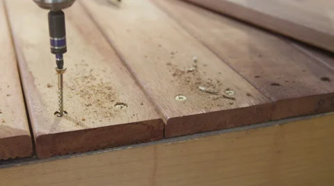 Handyman drills in a screw Stock Footage 46690870